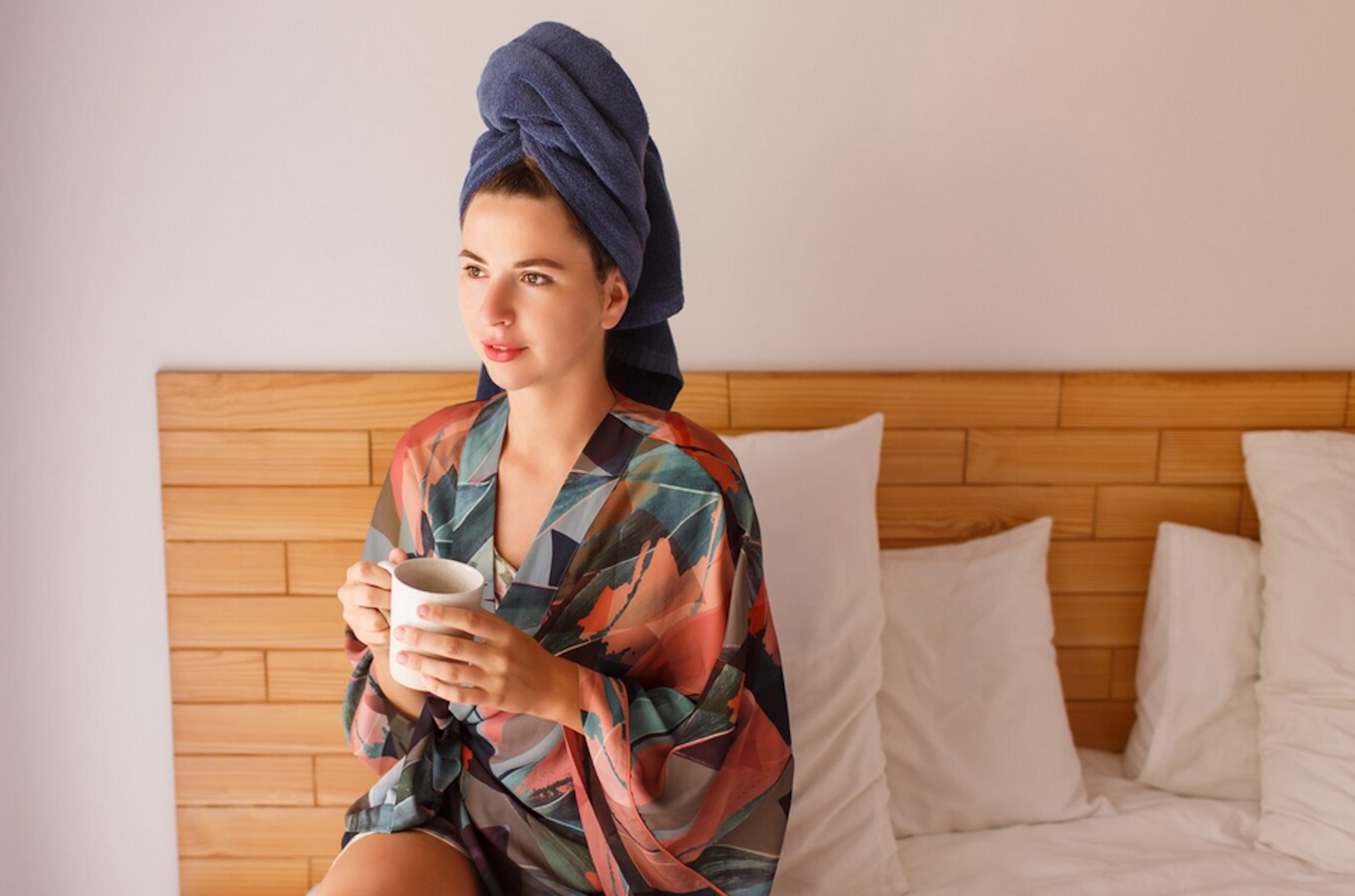 close-up-portrait-pretty-woman-wrapped-towel-bathrobe-waking-up-morning-sitting-bed-drinking-tea