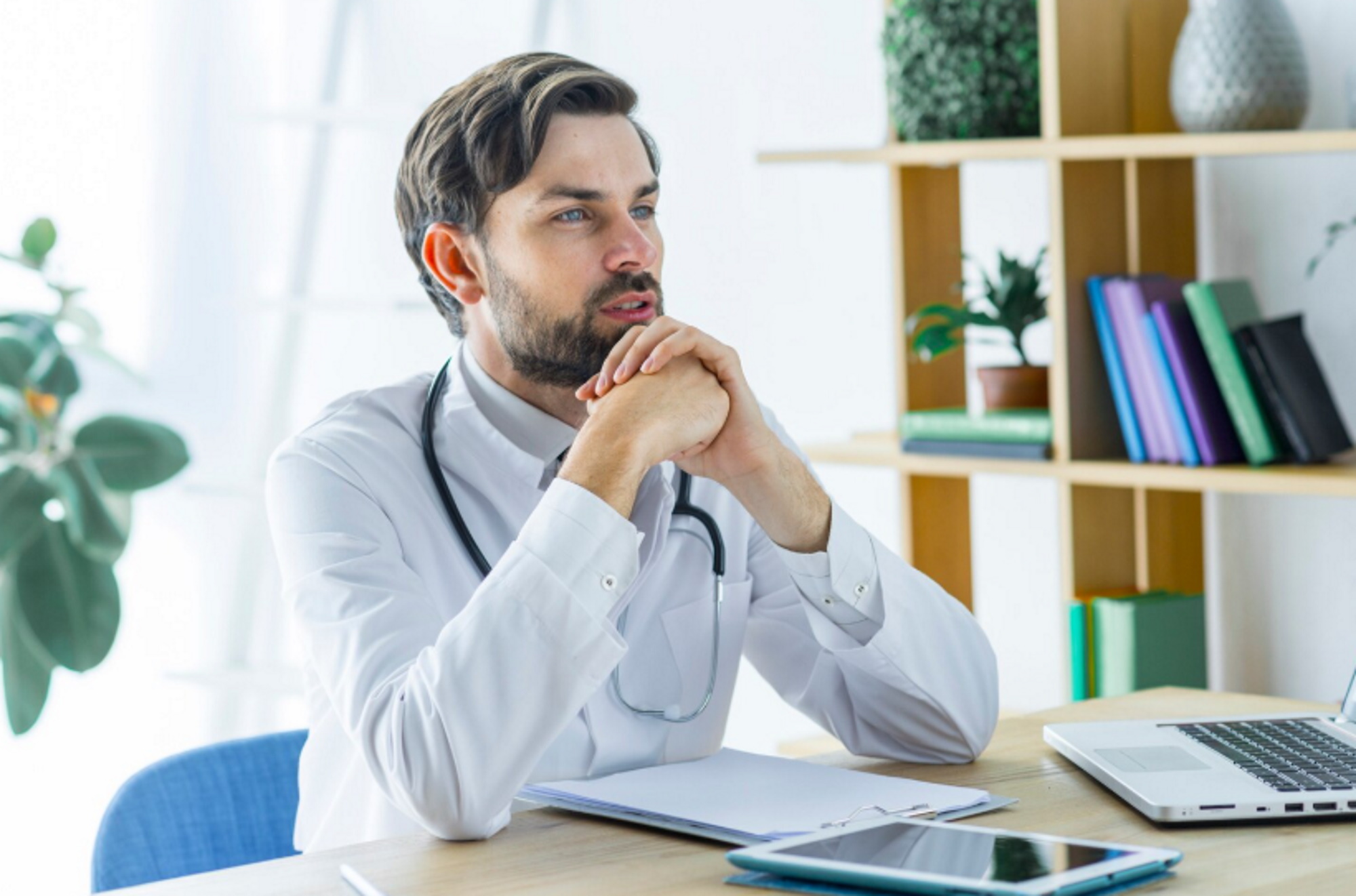 young-doctor-thinking-office-oncologist