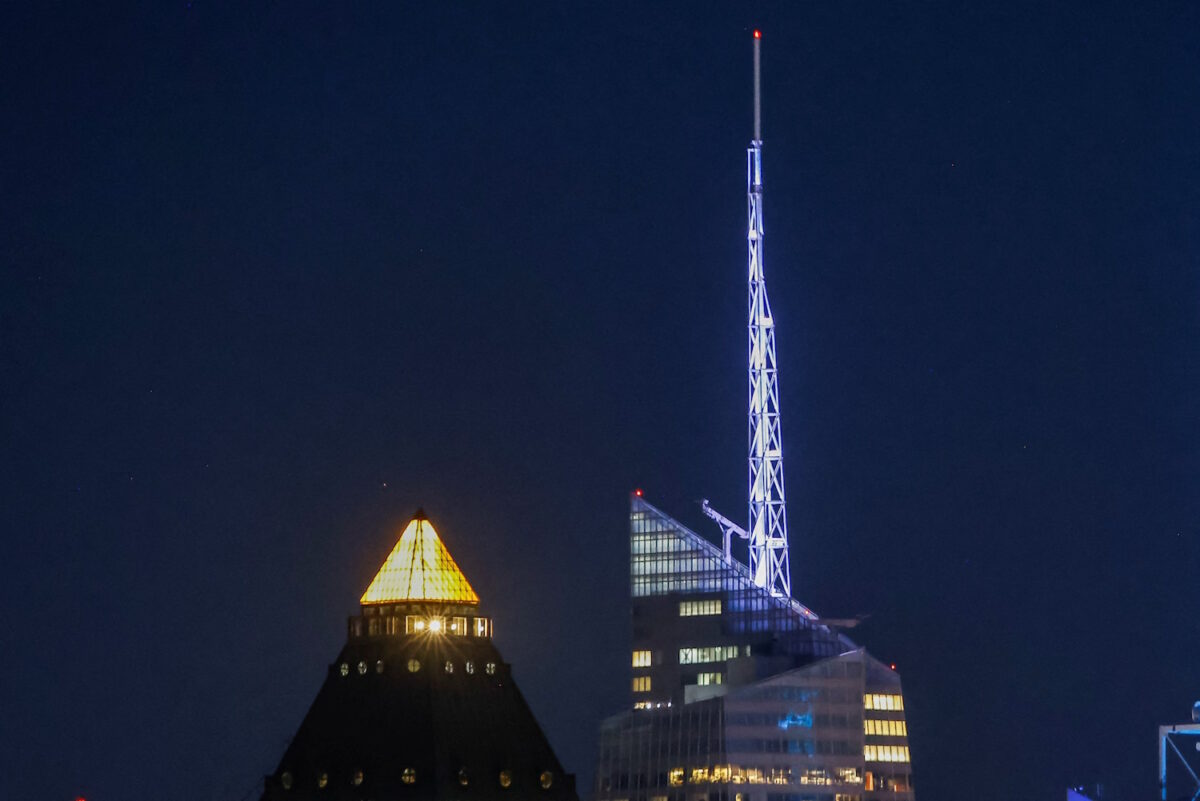 The Bank of America headquarters building in New York City is lit up for the SpaceX initial public offering as it is seen from West New York, New Jersey, U.S., June 4, 2026. 