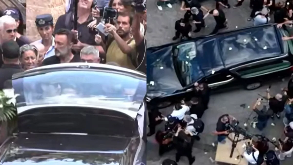 Κηδεία Μαζωνάκη: Το τελευταίο χειροκρότημα στη Νίκαια, λευκά τριαντάφυλλα στη νεκροφόρα
